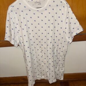 Calvin Klein Jeans White Tee with Blue Logo Pattern